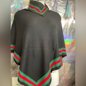 Beautiful stylish Gucci style Shaw that has a triangle cut on the front.